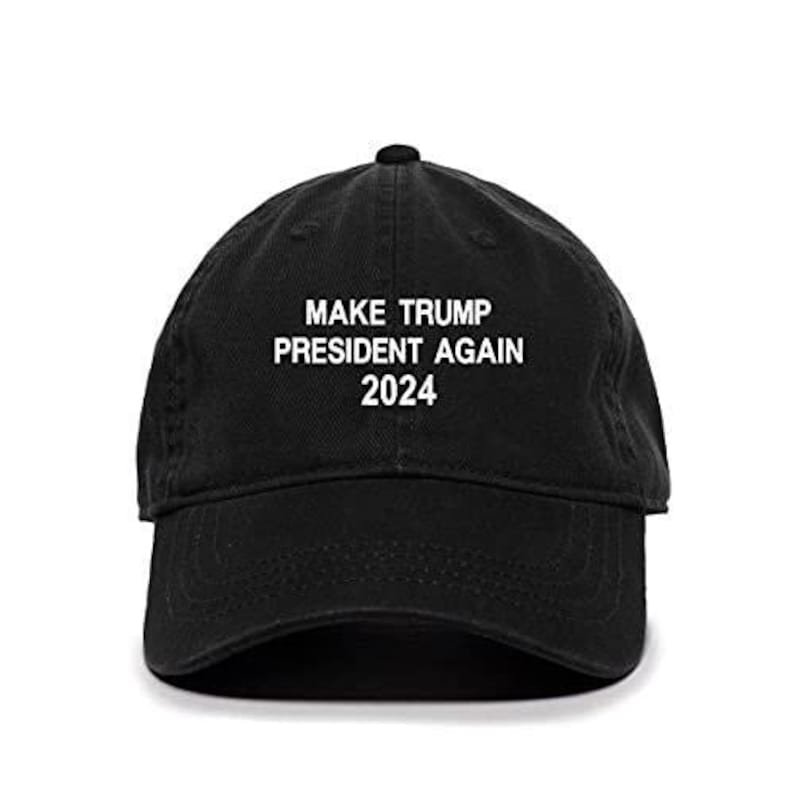 May include: Black baseball cap with white embroidered text that reads "Make Trump President Again 2024".
