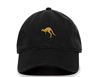 May include: A black baseball cap with an embroidered yellow kangaroo on the front.