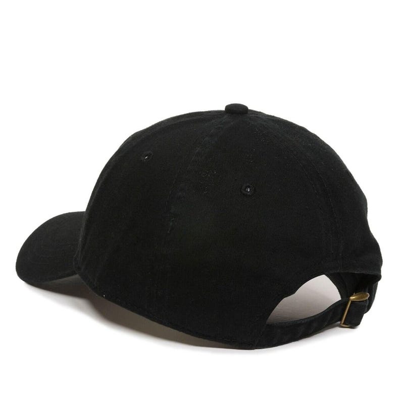 May include: A black baseball cap with a curved brim and an adjustable strap.