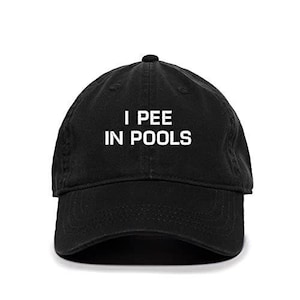 May include: A black baseball cap with the text "I PEE IN POOLS" embroidered in white.