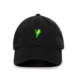 May include: Black baseball cap with an embroidered corn cob design in green and yellow.