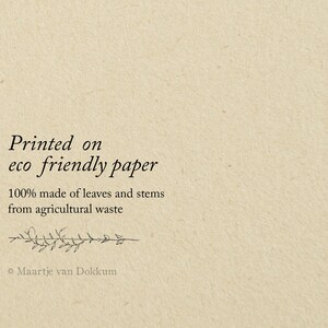 May include: A textured beige paper surface featuring black printed text that reads: Printed on eco friendly paper, 100% made of leaves and stems from agricultural waste, with a small botanical line drawing and the name Maartje van Dokkum.