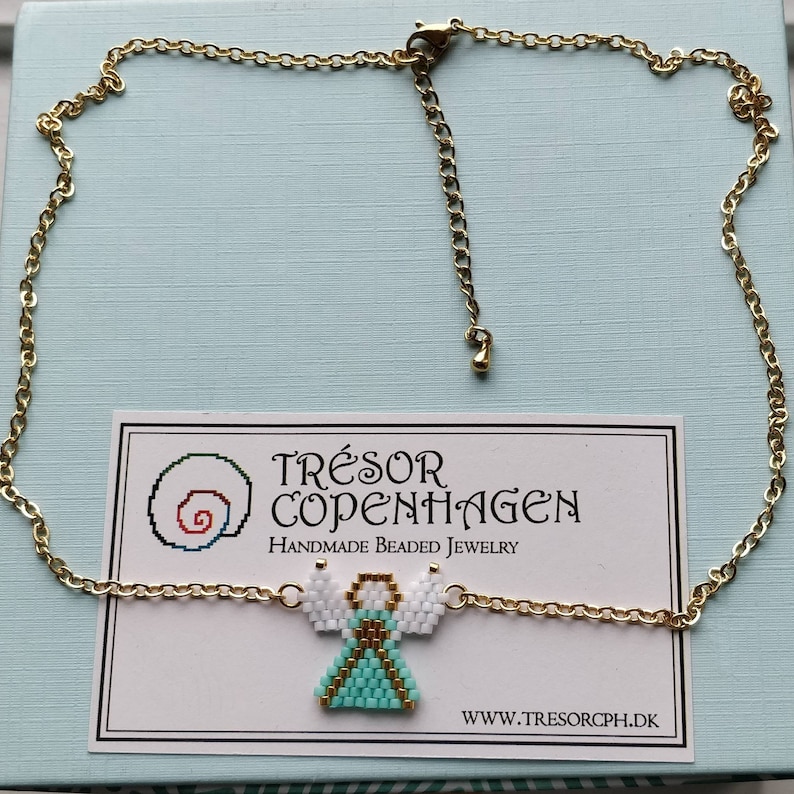 Beautiful Christmas Angel beaded necklace in mint green white and gold