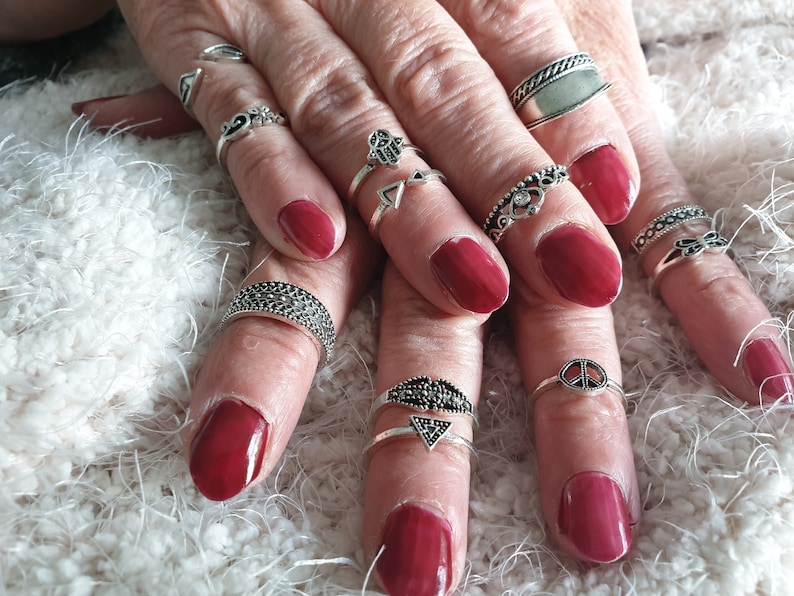 Set of 12 rings silver-colored