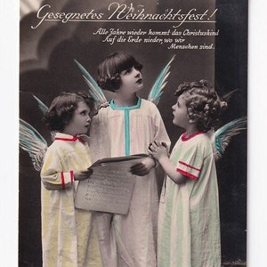 Engel-Chor mit Notenblatt "Alle Jahre wieder", deutsche Vintage-Postkarte,  Fotografie, 1931