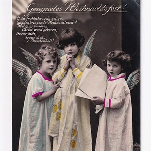 Engel-Chor mit Notenblatt "O du fröhliche", deutsche Vintage-Postkarte,  Fotografie, 1933
