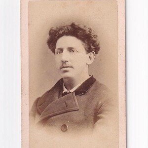 Handsome man with a special hairstyle, Swiss Visitfoto (Louis Colin, La-Chaux-de-Fonds)