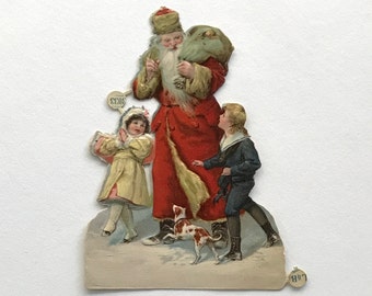 Santa Claus in red with dog and children, antique wafer from Germany