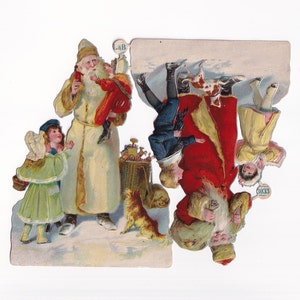 2 Santa Clauses with dogs and children, antique wafers from Germany