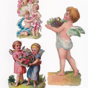 Putten mit Blumen, 3 antike Oblaten