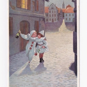 Pierrot y Columbine de noche en la ciudad, postal alemana antigua, enviada en 1926