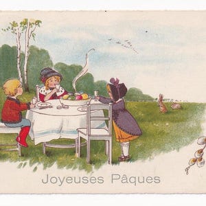 Bambini che mangiano le uova di Pasqua all'aperto, cartolina d'epoca tedesca, inviata nel 1929