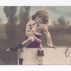Ragazzo con pagliaccio che salta, antica cartolina tedesca, spedita nel 1905