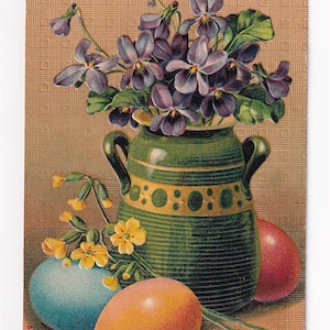 Uova di Pasqua accanto a violette in un vaso di ceramica, antica cartolina tedesca, inviata nel 1911