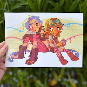 May include: A colorful illustration featuring two animated characters with vibrant hair and outfits. One character has blue and yellow hair, the other has orange hair and a helmet. They are seated, with one holding a small object. The background has graffiti-style art.