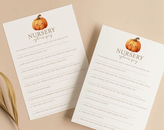 May include: Two white rectangular nursery rhyme quiz cards featuring a smiling orange pumpkin illustration at the top. The text reads Nursery Rhyme Quiz followed by ten numbered questions about classic rhymes. The cards have a clean, simple layout.