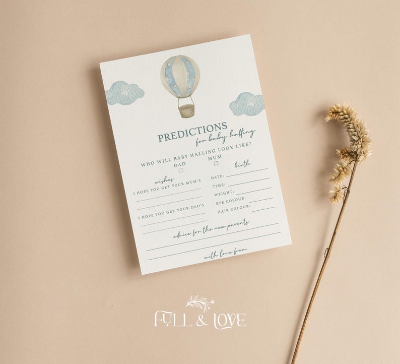 May include: A white baby shower prediction card featuring a watercolor illustration of a blue and beige hot air balloon with clouds. The text includes PREDICTIONS for baby halling, WHO WILL BABY HALLING LOOK LIKE, wishes, and birth details.