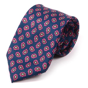 May include: A dark blue silk tie with a pink paisley pattern.