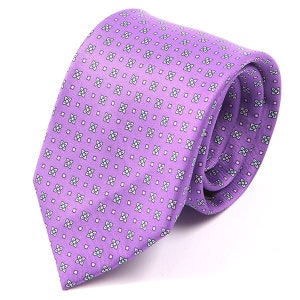 May include: A purple tie with a white and green floral pattern.