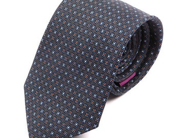 May include: A dark gray patterned tie with a repeating pattern of small blue, white, and orange circles. The tie is made of a smooth, silky fabric.