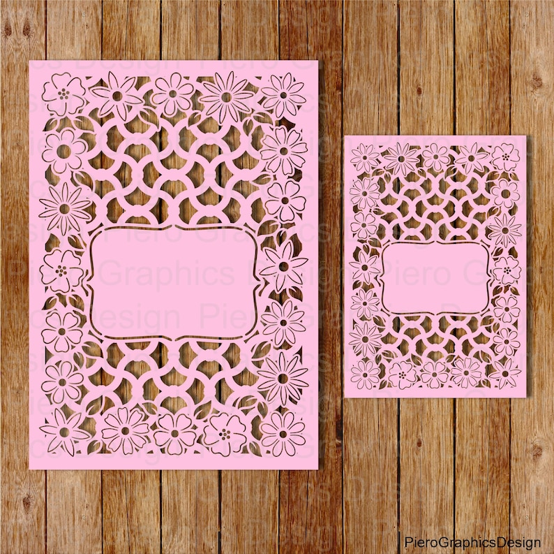 May include: Two pink paper cut-out designs with a floral border and a geometric pattern. The larger design has a blank rectangle in the center. The smaller design has a blank rectangle in the center. The text "Graphics Design Piero" is at the bottom of the image.
