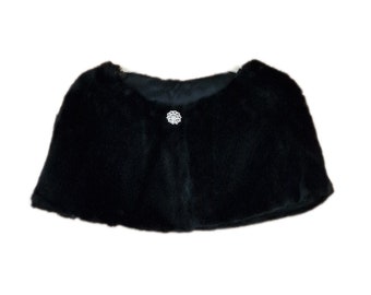 JUST ARRIVED! Sleeveless Faux Fur Shrug in Black with Crystal Brooch. Very Sophisticated and Gorgeously Elegant! Would make a lovely Gift..