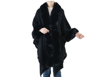 NEWLY ARRIVED Luxurious Hand Knit Chunky Crochet Cape in Black. With Sumptuous Faux Fur trim. Absolutely Stunning!