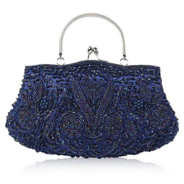 Sparkle and Shine with our Exquisite Navy Beaded Evening Bag Perfect for a black-tie event, wedding, or any other special occasion.