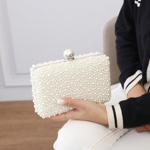 Beautiful Evening/Wedding Pearl Bridal bag. Will allow you to carry with a long strap or just hold in your hand. Fabulous Xmas Gift.