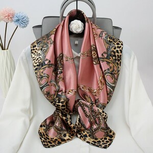 Unleash Your Inner Style Icon With Our Leopard Chain Print Satin Neck
