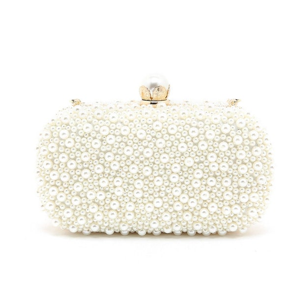 Beautiful Evening/Wedding Pearl Bridal bag. Will allow you to carry with a long strap or just hold in your hand.