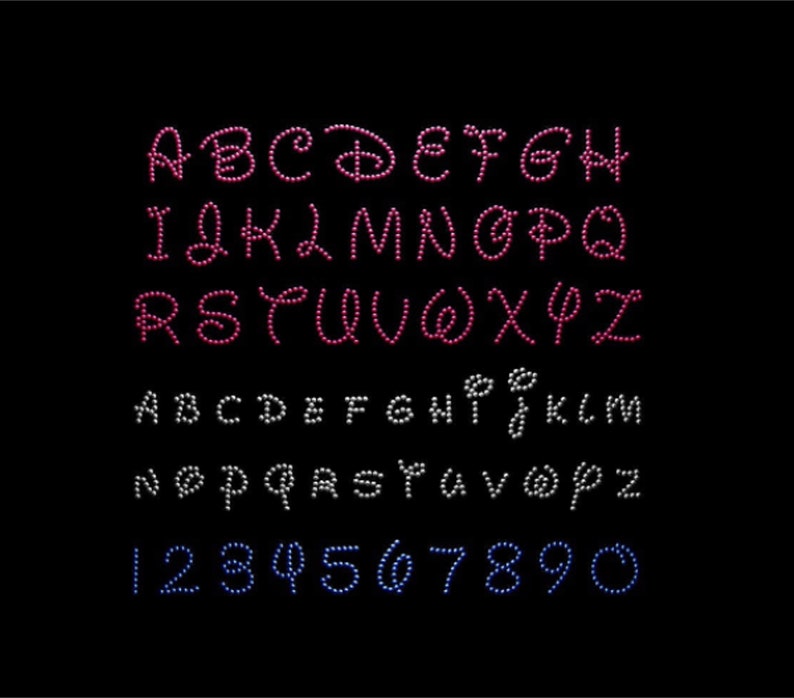 May include: A set of pink, white and blue rhinestone letters and numbers. The letters are in a cursive font and the numbers are in a simple font.