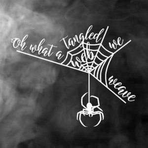 May include: A monochrome graphic of a spider's web with a spider suspended beneath it. The phrase "Oh what a tangled web we weave" is written across the web in a cursive script. The background is a smoky grey.