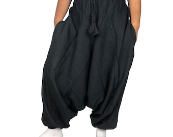 May include: Black loose-fitting pants with a drawstring waist and pockets. The pants are made of a soft, comfortable fabric.