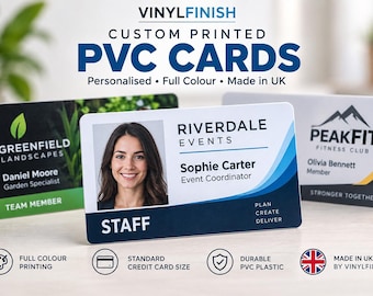 May include: Three rectangular PVC cards with custom printing. One card features a green landscape design for Greenfield Landscapes, another shows a portrait for Riverdale Events, and the third displays a PeakFit Fitness Club logo with yellow accents.