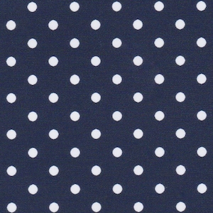 a blue background with white polka dots