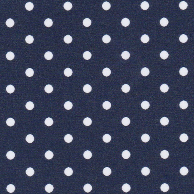 a blue background with white polka dots