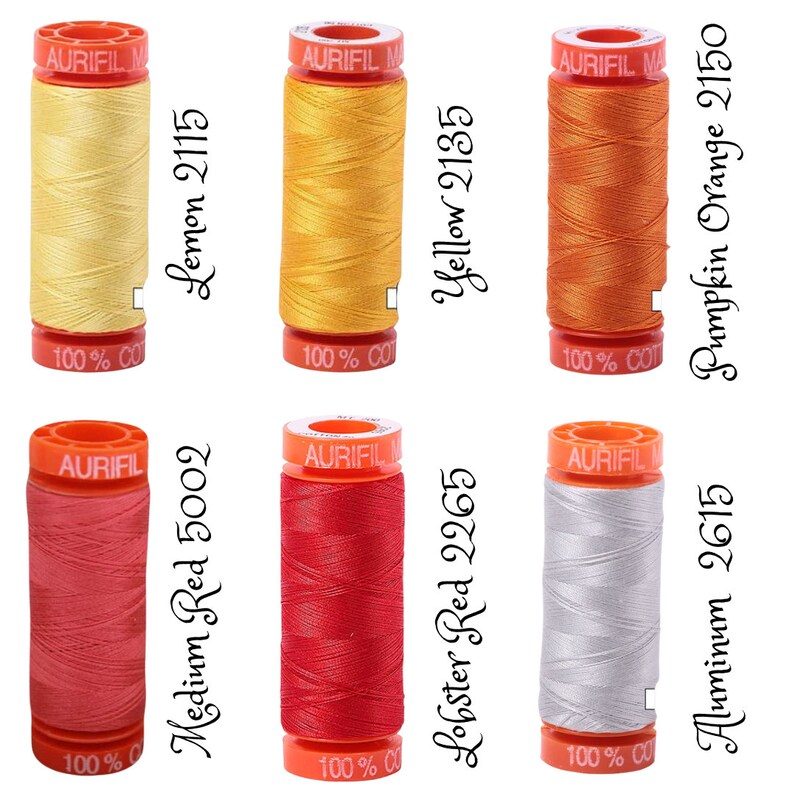 May include: Six spools of Aurifil thread in various colors, including lemon yellow, yellow, orange, red, and gray. Each spool is labeled with the Aurifil logo and the color name and number.