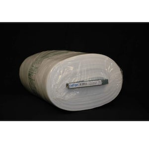 May include: A white roll of Pellon interfacing, a fabric used for stabilizing and strengthening fabrics, is wrapped in clear plastic.