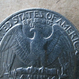 ERROR Coin: 1982-P Washington Quarter MISSING/WEAK Letters - Struck Through Grease Error