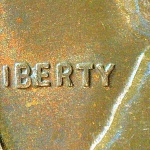 ERROR Coin: 1956-D Lincoln Wheat penny/cent BIE Die Chip in LIBERTY