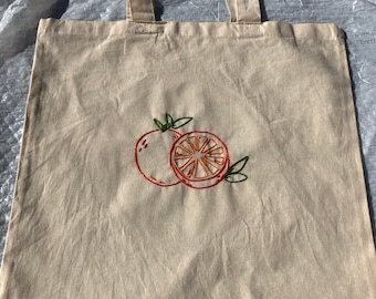 Handmade embroidered orange tote bag