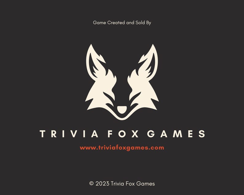 May include: A logo for Trivia Fox Games on a dark background. The logo features a stylized white fox head. The text "TRIVIA FOX GAMES" is below the fox head, with the website address www.triviafoxgames.com. The copyright notice is at the bottom.