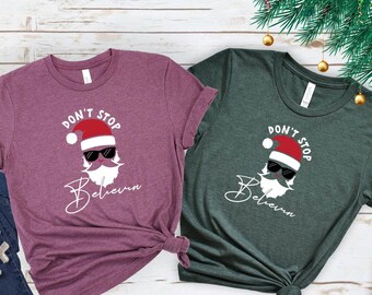 Don't Stop Believing Shirts,Christmas Family Vacation Tops,Santa Clause,Holiday Comfort Color Tees,Women's Christmas T-Shirt,christmas gifts