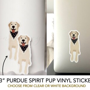 May include: A 3-inch vinyl sticker featuring a yellow Labrador Retriever wearing a black bandana with a white Purdue University logo. The sticker is available with a clear or white background. "Purdue Spirit Pup Vinyl Sticker" and "Choose from clear or white background" are printed below the image.