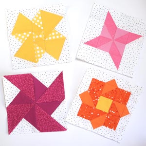 Pode incluir: Quatro blocos de colcha coloridos com designs geométricos. Um bloco apresenta um cata-vento amarelo com bolinhas brancas, outro uma estrela rosa, um terceiro um cata-vento magenta e o último uma flor laranja. Cada bloco está em um fundo branco com bolinhas pretas.
