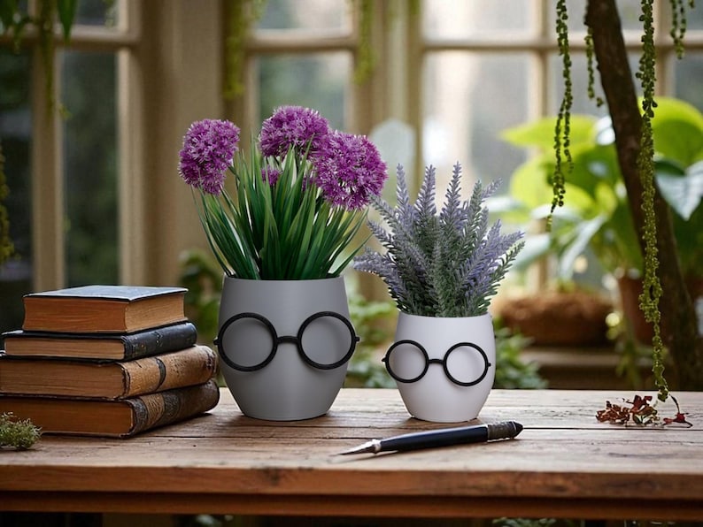 Brighten your room with our adorable glasses plant pot! A unique gift for plant lovers or a stylish desk organizer. Made from high-quality, biodegradable materials.