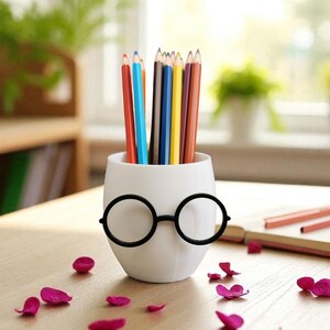 Transform your space with our quirky glasses plant pot! Perfect for plants or as a chic desk organizer. Eco-friendly and designed with 3D printing technology.