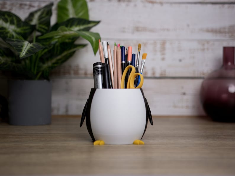 This cute Penguin planter is an excellent addition to any contemporary home, bringing joy to any space.