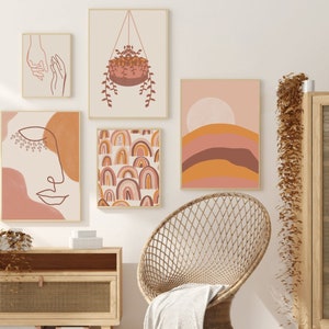 May include: A set of five abstract art prints in a boho style with a color palette of pink, orange, and brown. The prints feature line art, geometric shapes, and a hanging plant.